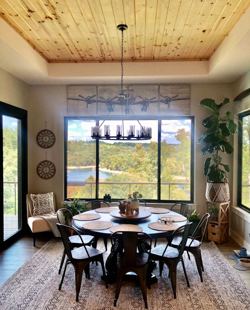 a dining room with a table and chairs
